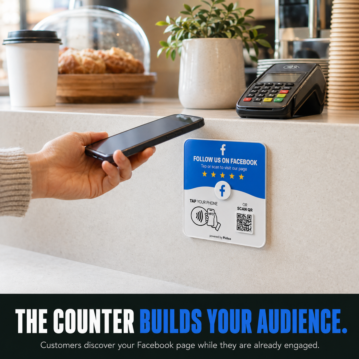Customer tapping a phone on the Pixlico Facebook follow plate at a cafe counter