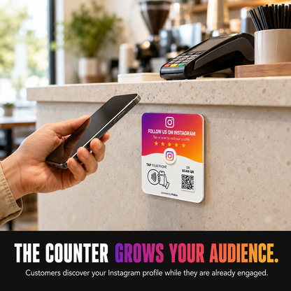 Customer tapping a phone on the Pixlico Instagram follow plate at a cafe counter