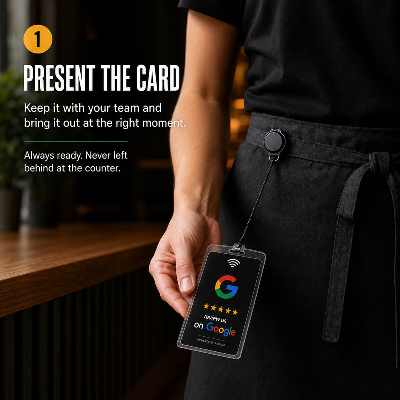 Server wearing the Pixlico Google review card on a belt retractor, presenting it to a customer